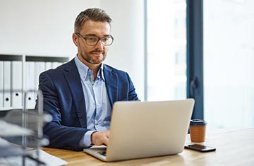 Business man working on a laptop